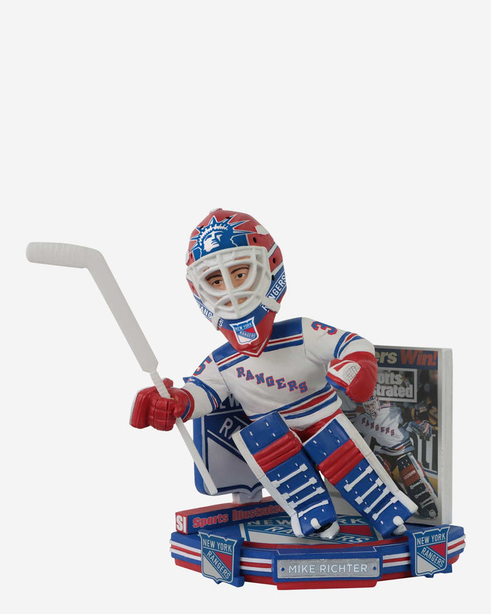 New York Rangers goalie Mike Richter tries to get out from under