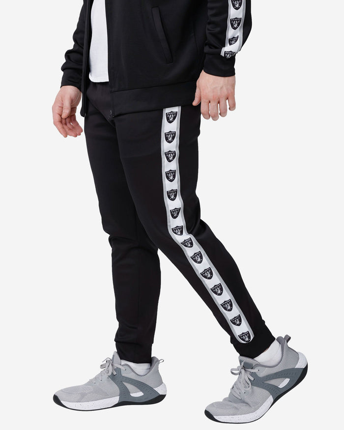 Raiders track hot sale pants