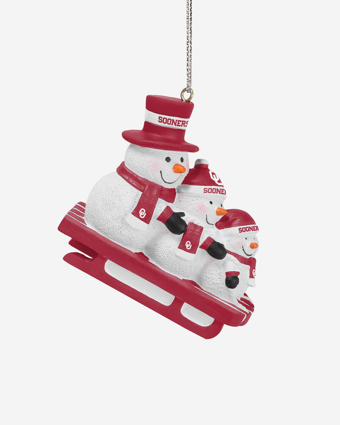 Oklahoma Sooners Sledding Snowmen Ornament FOCO - FOCO.com